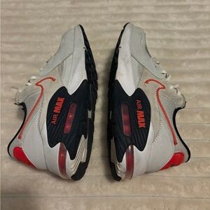 Nike Air Max Sneakers in White and Red with Black Soles